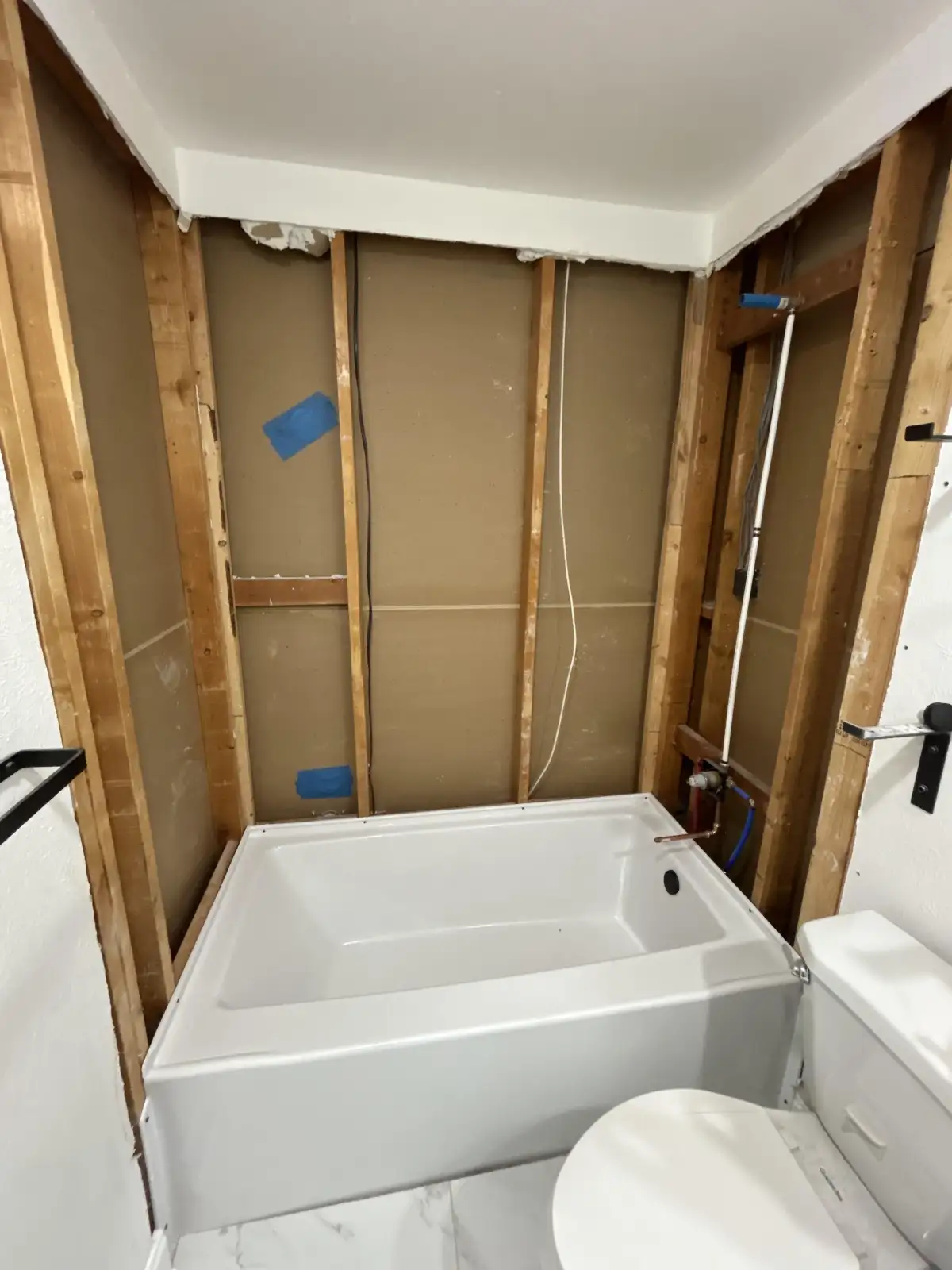 Professional bathroom contractor completing tile installation in Fort Worth home