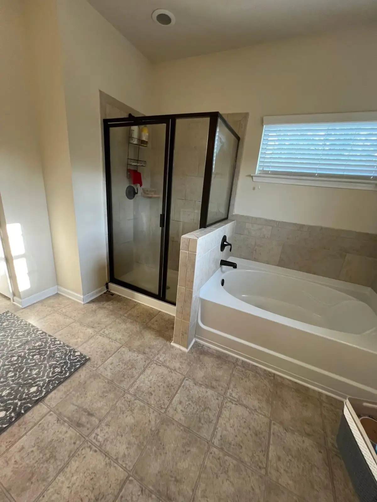 Expert bathroom contractor installing shower tile in Arlington TX