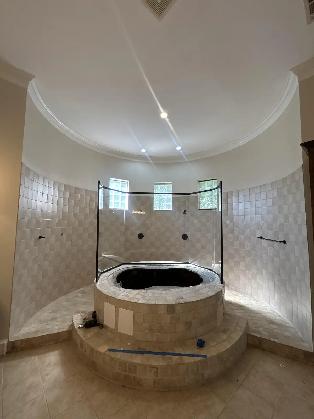 Custom marble bathroom renovation with dual vanity and walk-in shower in Arlington TX