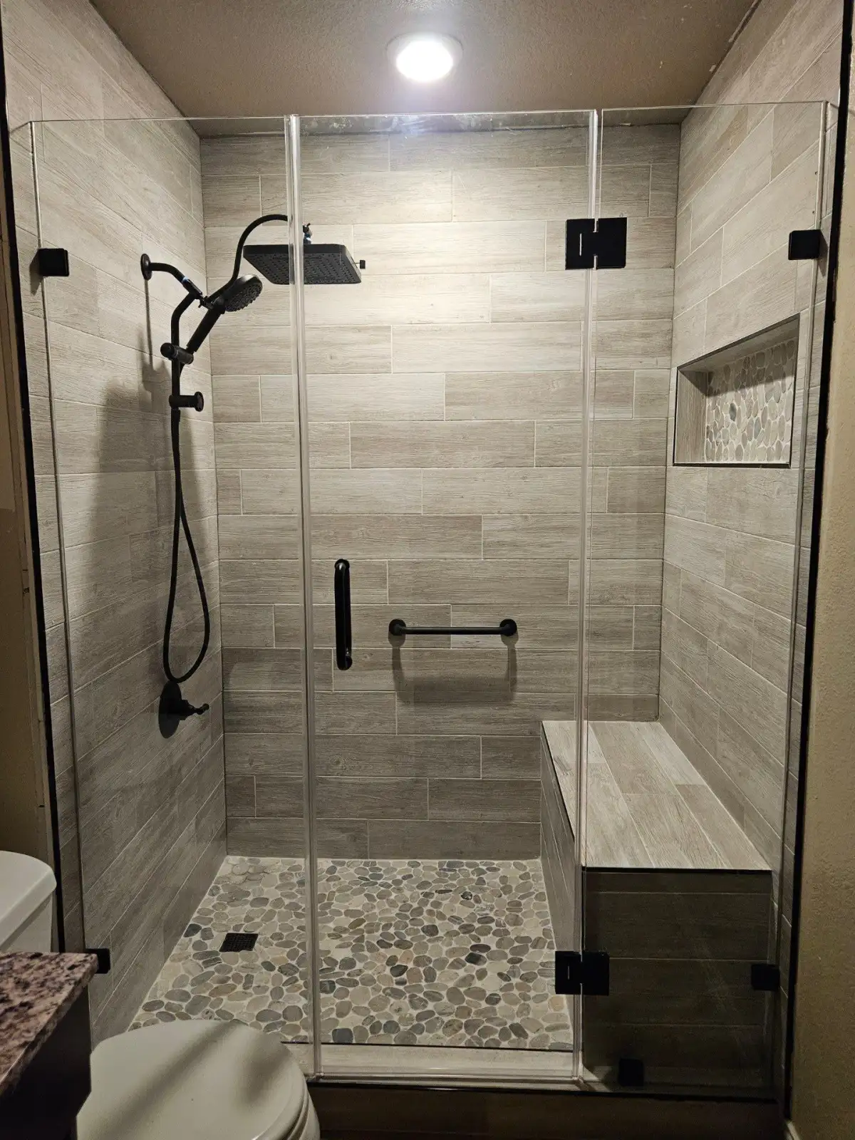 Completed bathtub to walk-in shower conversion in Arlington TX